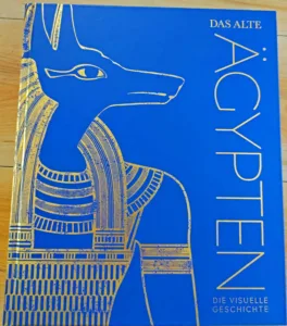 Das Cover des Buches "Das alte Ägypten - Die visuelle Geschichte" von Steven Snape zeigt eine vergoldete Abbildung des Gottes Anubis.